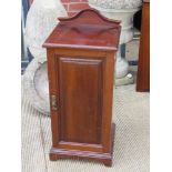 A single mahogany pot cupboard having field moulded door and single shelf, measuring 37 x 36 x