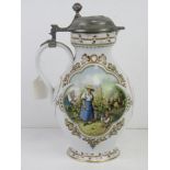 A Franklin Porcelain Rupert Schneider Weinlese design ewer with pewter lid.