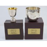 A HM silver presentation bowl together with a HM silver presentation bottle top trophy, each in