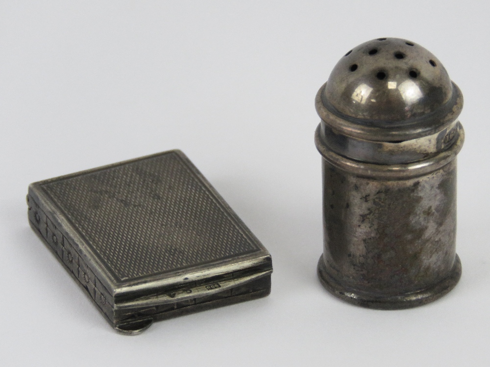 An HM silver miniature pepperette together with a continental silver (900 grade) stamp box opening