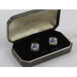 The Jester Club; a pair of HM silver enamelled cufflinks having jester depiction to one side with
