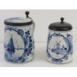 Two late 19th/early 20thC Delft lidded tankards, the larger having ceramic and pewter lid with