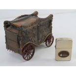 A vintage 'Equibank' carriage design money box marked for Banthrico Inc Chigago USA, one wheel a/