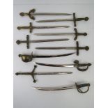 A collection of decorative miniature letter opener sized swords of historic themes, ten items.