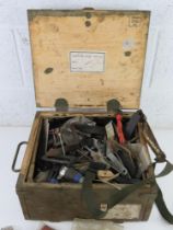 A quantity of assorted militaria inc Soviet badges, magazines, cleaning kits,