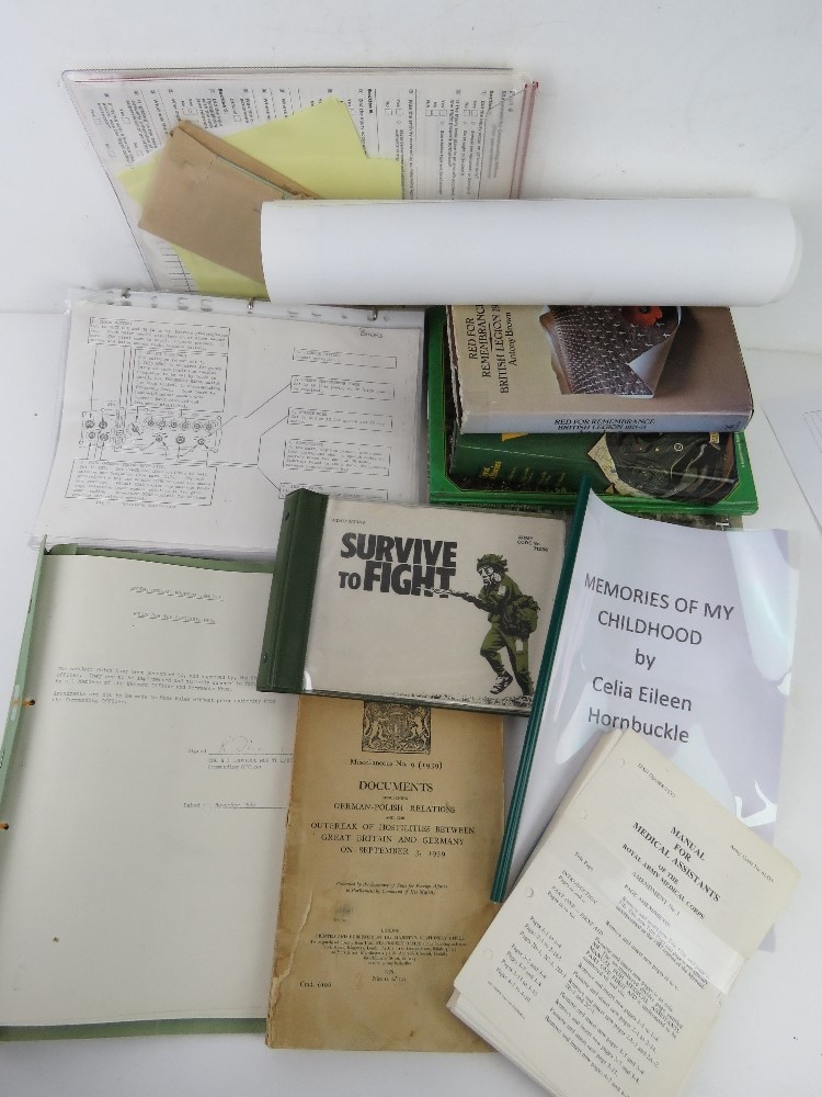 A quantity of military themed books and documents including;