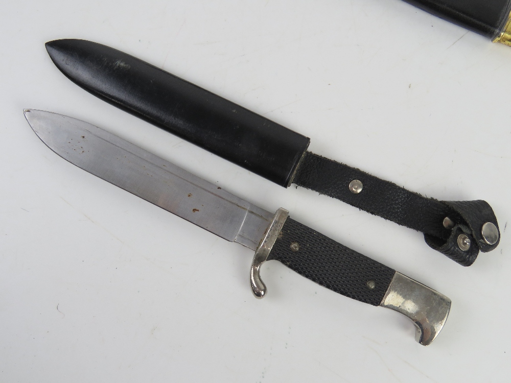 Three reproduction WWII German daggers; Hitler Youth, Officers and a Ceremonial Dagger. - Image 4 of 8