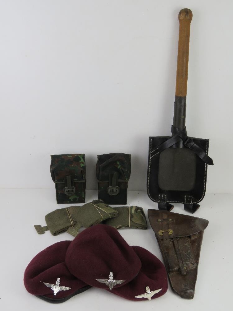 A quantity of assorted militaria inc; Bundeswehr trenching tool and cover,