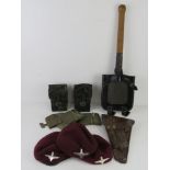 A quantity of assorted militaria inc; Bundeswehr trenching tool and cover,