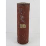 An inert WWII German sIG 33 field cannon round, with original label upon.