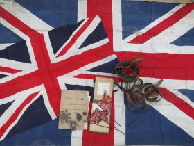 A vintage Union Jack fabric flag together with another flag, desktop type flag decorations,