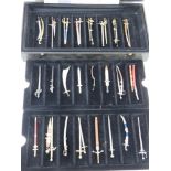 A collection of decorative miniature pewter letter opener sized swords by Mayfair 'Limited Edition