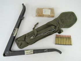 An M16 Vietnam era sling in original packaging, together with bipod and bag with 10 x 5.