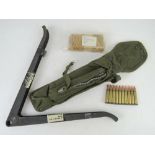 An M16 Vietnam era sling in original packaging, together with bipod and bag with 10 x 5.