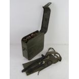 A WWII Russian Maxim ammo tin having two oil cans within, also a Maxim gunners kit in pouch.