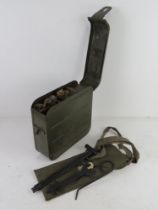 A WWII Russian Maxim ammo tin having two oil cans within, also a Maxim gunners kit in pouch.