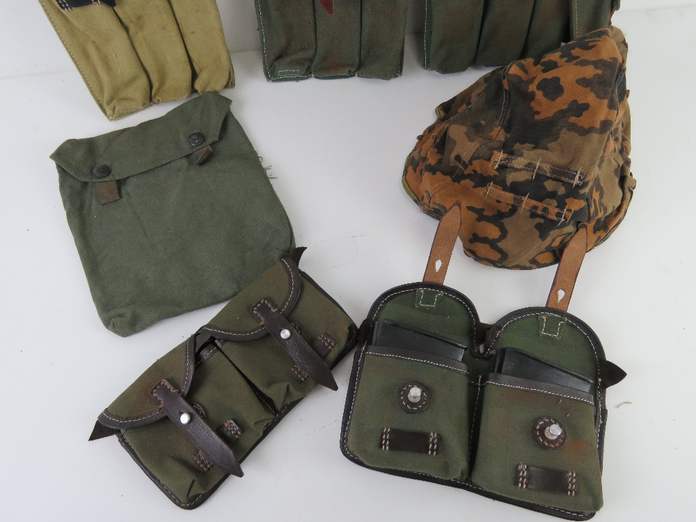 A quantity of assorted reproduction militaria; WWII German MP40 magazine pouches, - Image 3 of 3