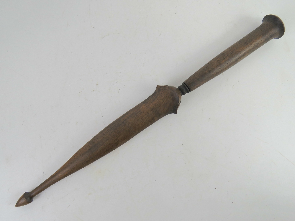 A Kris spear head blade, hand forged with wooden scabbard.