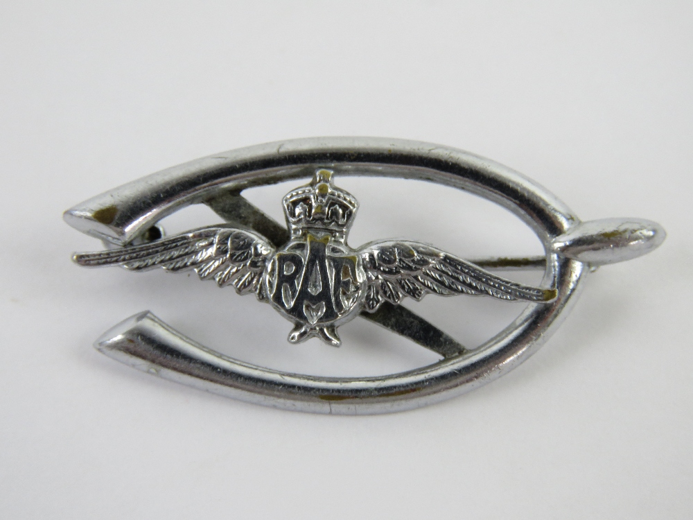 A chrome RAF 'Wings' and wishbone sweetheart brooch.