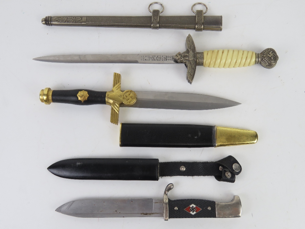 Three reproduction WWII German daggers; Hitler Youth, Officers and a Ceremonial Dagger. - Image 2 of 8