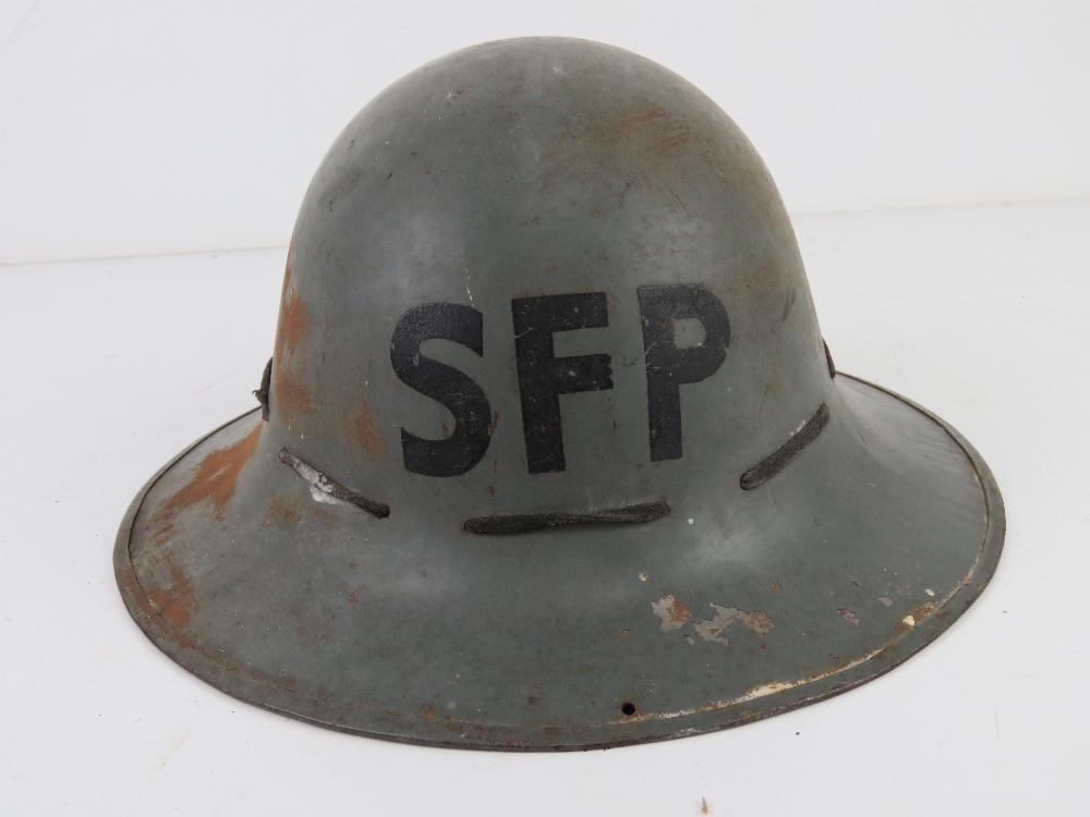 A WWII British Army 1941 Home Front Civil Defence SFP Zuckerman tin helmet with liner, - Image 2 of 5
