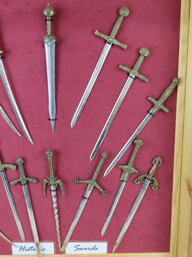 A collection of decorative miniature letter opener sized swords of historic themes, fifteen items. - Image 3 of 3