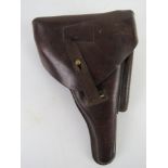 A WWI German Officer's Luger holster, adapted with an extra pouch for a cleaning tool.