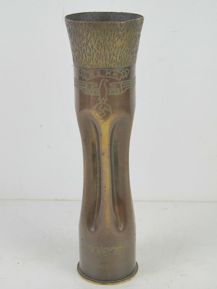 A WWII German NSKK Trench art shell case, made from a Russian shell case, dated 1941.