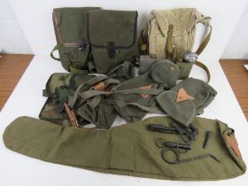 A WWII Maxim gunners kit in pouch together with a M1 carbine gun pouch, a maxim oil bottle,