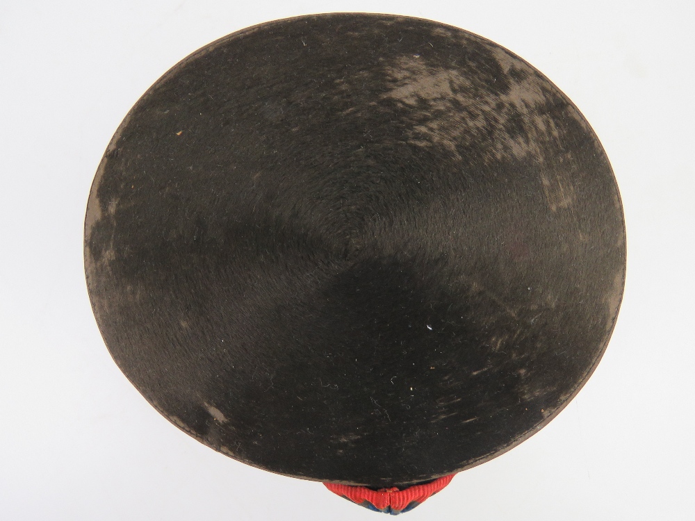 A French 19thC coachman's black silk top hat having red, blue and (silvered thread) cockade to one s - Image 6 of 6