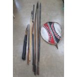 A collection of African items inc four spears, a sword, bow with a bag of six arrows,
