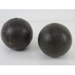 Two large cannon balls.