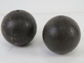 Two large cannon balls.
