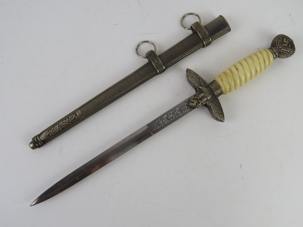 Three reproduction WWII German daggers; Hitler Youth, Officers and a Ceremonial Dagger. - Image 7 of 8