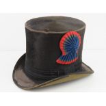 A French 19thC coachman's black silk top hat having red, blue and (silvered thread) cockade to one s