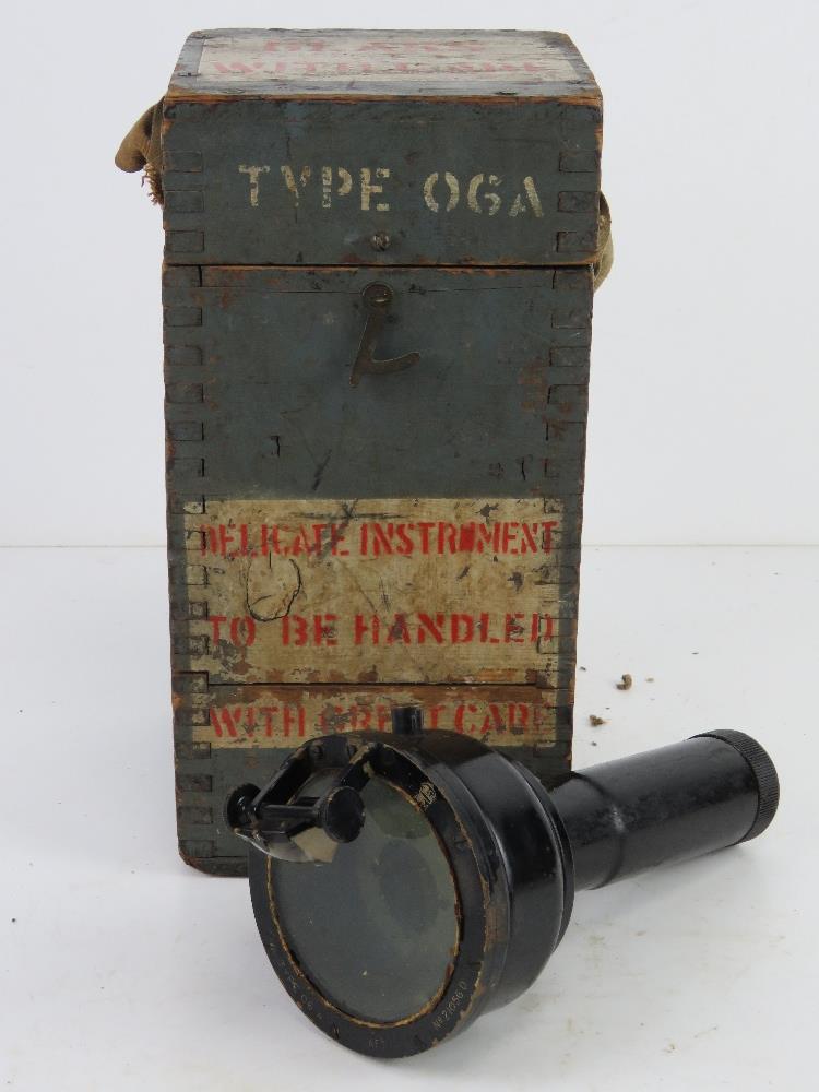 A WWII Type 06A hand bearing compass in box, the box bearing original paint and stencilling,