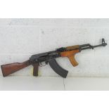 A deactivated Romanian AKM Assault Rifle, with fully moving bolt (under spring pressure),