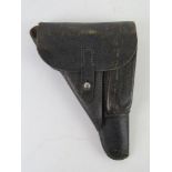 A WWII German P38 holster, makers code clg, dated 1944 with a Waffenamt stamp,