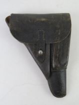 A WWII German P38 holster, makers code clg, dated 1944 with a Waffenamt stamp,