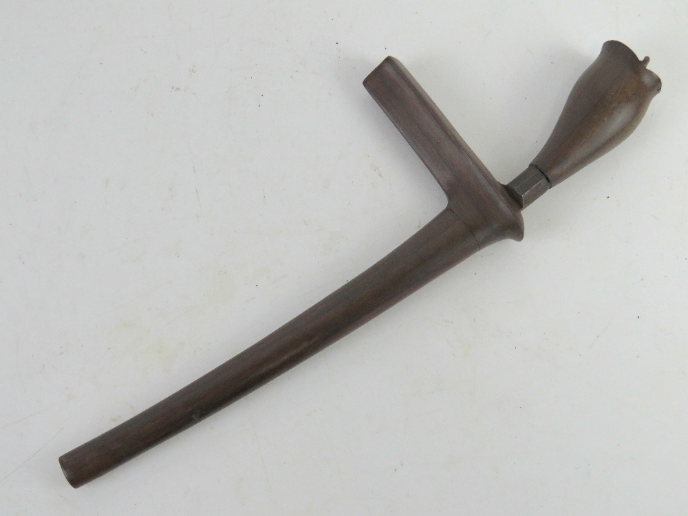 A Kris knife with scabbard.