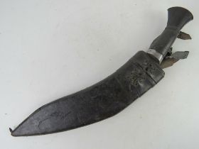 A Gurkha Kukri knife with scabbard and Karda blade.