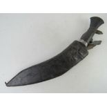 A Gurkha Kukri knife with scabbard and Karda blade.