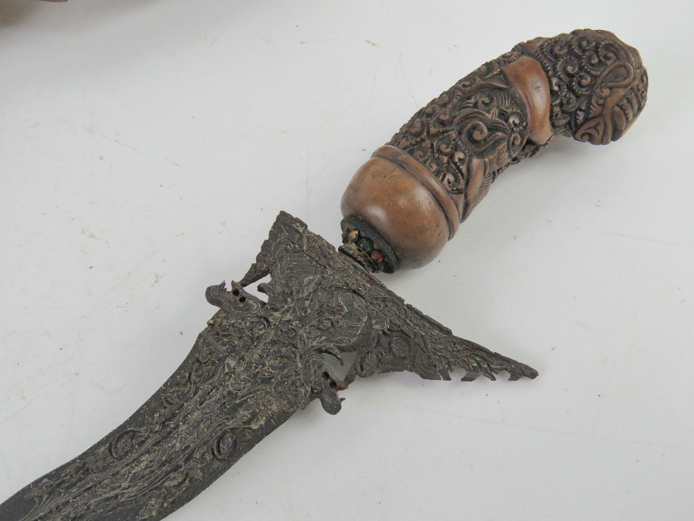 A Kris knife with scabbard having hand carved handle set with stones. - Image 4 of 4
