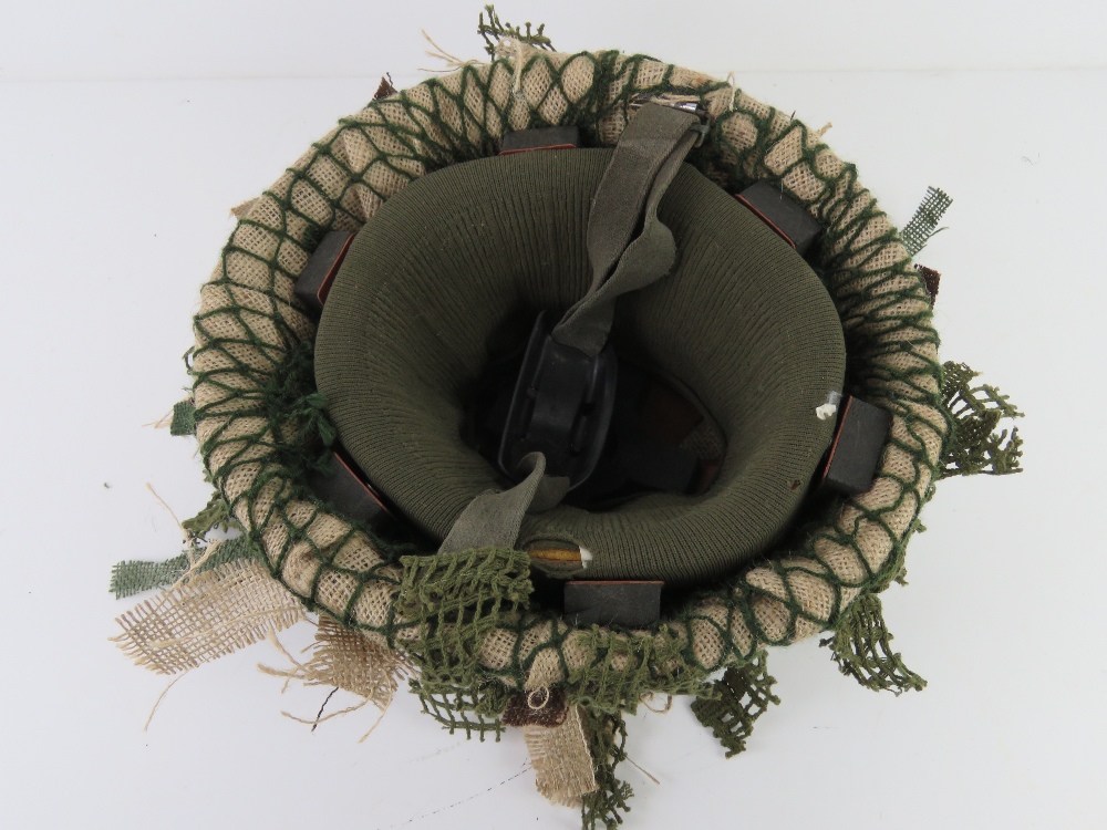 A 1977 British Brodie helmet with liner and camo netting. - Image 3 of 3