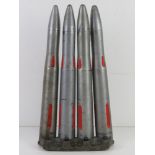 Four inert 40mm Bofors training rounds on clip.