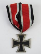 A reproduction WWII German Knight cross, with ribbon.