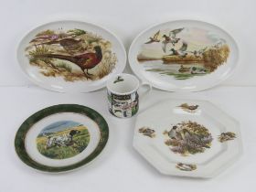 A pair of ornithological game bird Wedgwood metallised oval serving plates,