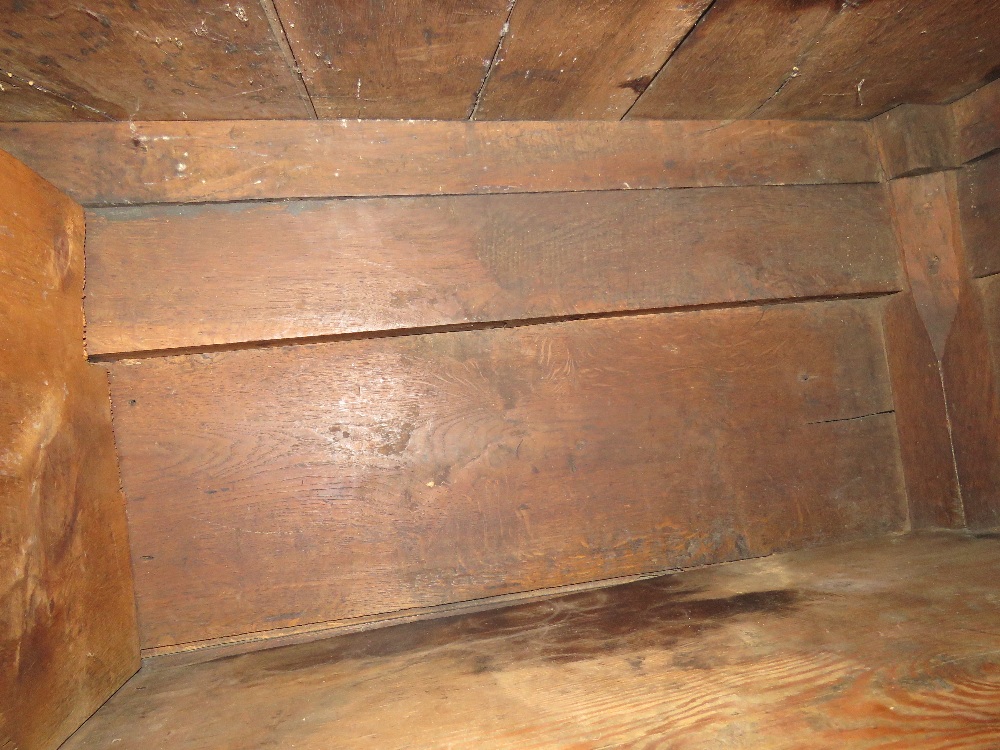 An 18th century oak court style cupboard having central field moulded panel to middle section and - Image 9 of 9