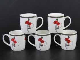 A set of five contemporary mugs having Renee Mackintosh pattern upon.