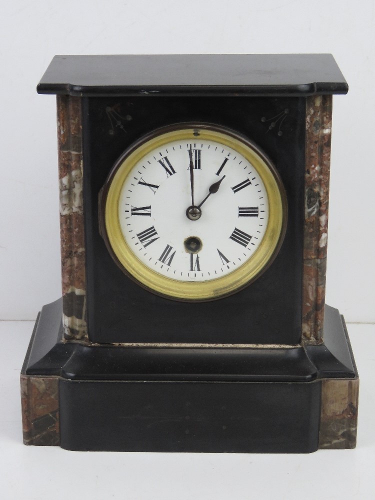 A slate and marble architectural mantel clock, 21cm wide.